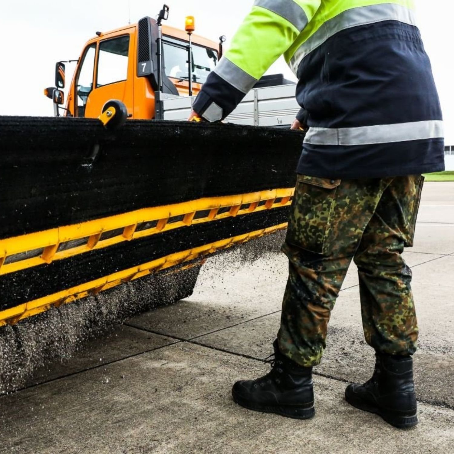 FOD BOSS emptying Runway sweeper