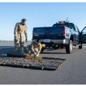 United States Air Force using the FOD* BOSS ultimate Airport Sweeper